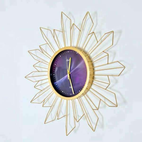 Grote design wandklok gouden ster