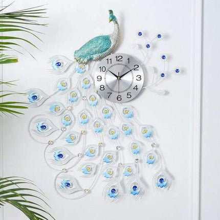 Grote wandklok met blauwe pauw