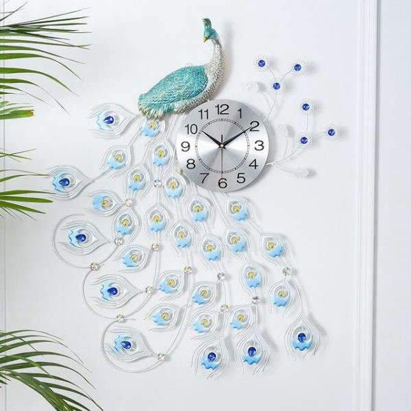 Grote wandklok met blauwe pauw