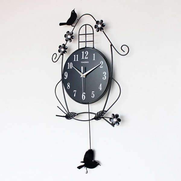 Zwarte slingerklok met vogels design
